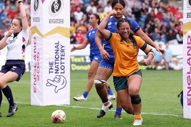 Cecilia Smith of Australia celebrates scoring her team's eighth try.