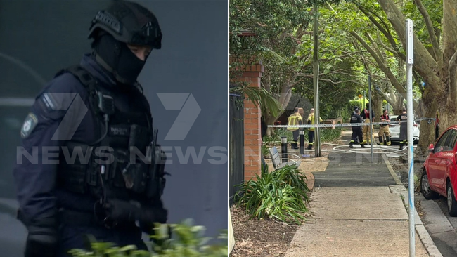 Police are searching for a man armed with a firearm who ran off from the scene of a burning car in Dulwich Hill on Friday morning.