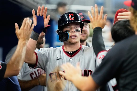 Making a splash: Cleveland Guardians’ Travis Bazzana is congratulated in the dugout. The Australian has quickly become a favourite of Guardian supporters.