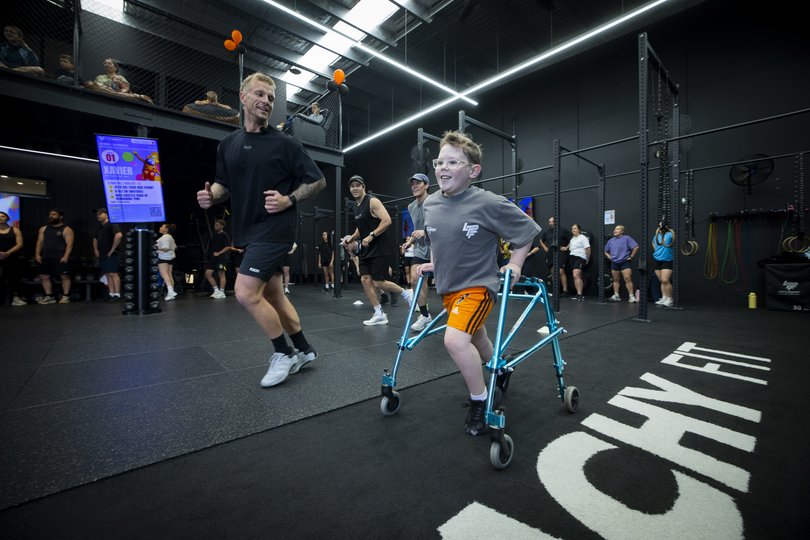 Xavier Summersrunning with Ben Luckens, Director of Lifes Peachy Fit Byford during the 24hr workout for Telethon in Byford, Perth.