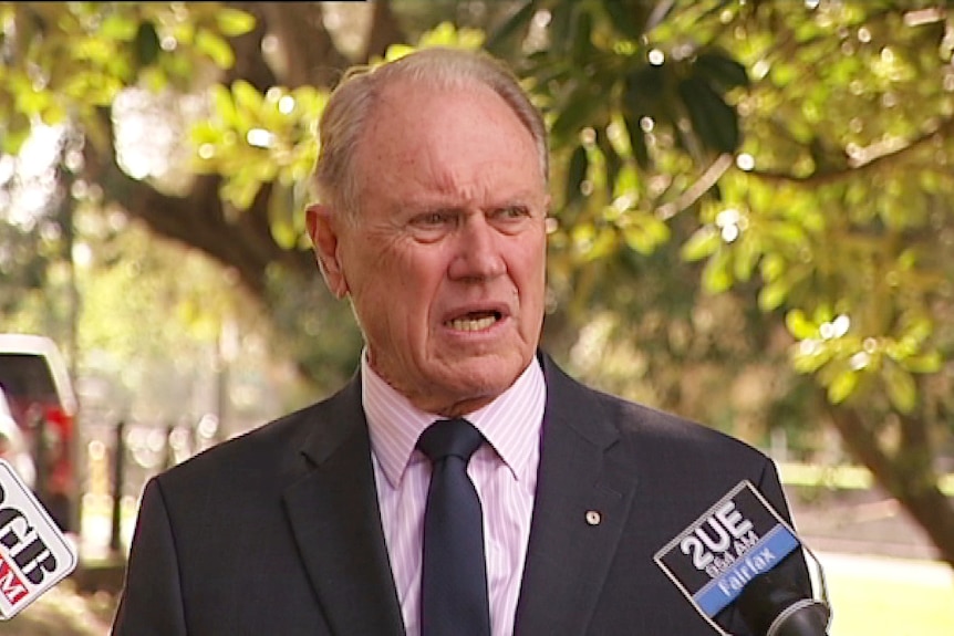 Bruce Baird talks to the media