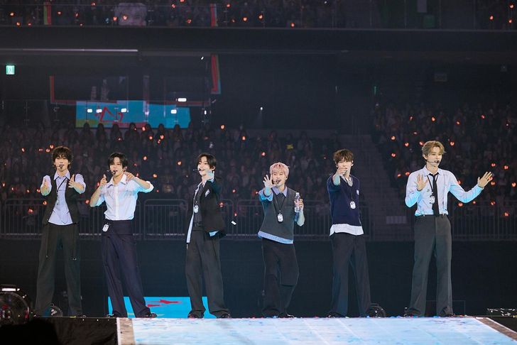 K-pop boy group RIIZE performs during its third-anniversary fan meeting, 'Ch. RIIZE : ON AIR,' at Inspire Arena in Incheon, Sept. 12. The two-day event drew about 23,000 fans, and a video played after the show revealed the group's upcoming plans. Courtesy of SM Entertainment