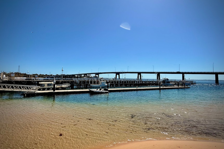Image of a road bridge stretching over a body of water.