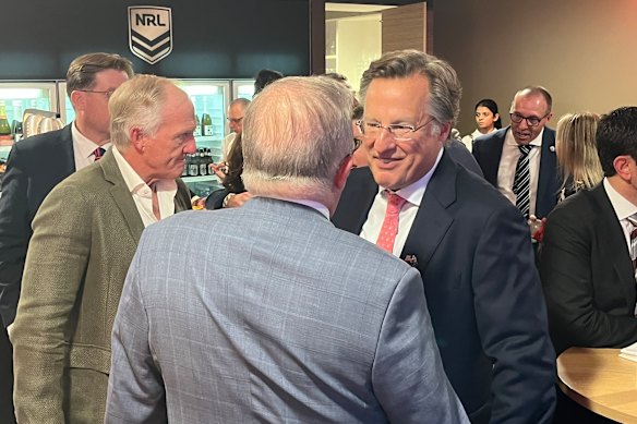 Greg Norman (left) was among the guests of the NRL, along with US ambassador David Brat (orange tie) and Prime Minister Anthony Albanese (foreground) at the 2026 NRL grand final in Sydney last week. 