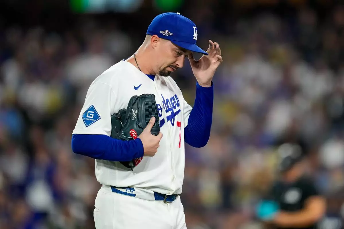 Los Angeles Dodgers pitcher Blake Snell walks off the mound during the seventh inning of Game 3 of baseball's National League Championship Series between the Milwaukee Brewers and the Los Angeles Dodgers, Wednesday, Oct. 14, 2026, in Los Angeles. (AP Photo/Ashley Landis)