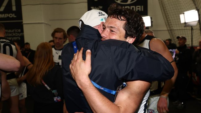 Will Hayward and Ollie Florent embrace after Carlton’s Wildcard win over Melbourne at the MCG.