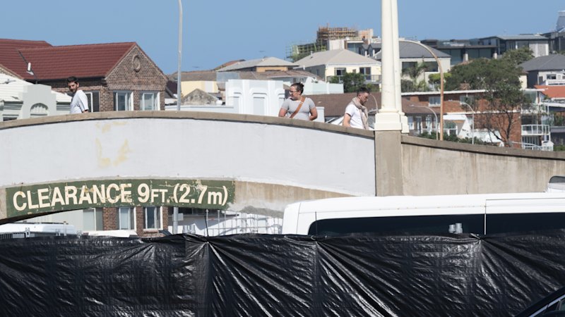 Bondi beach footbridge: Man charged over ‘offensive behaviour’