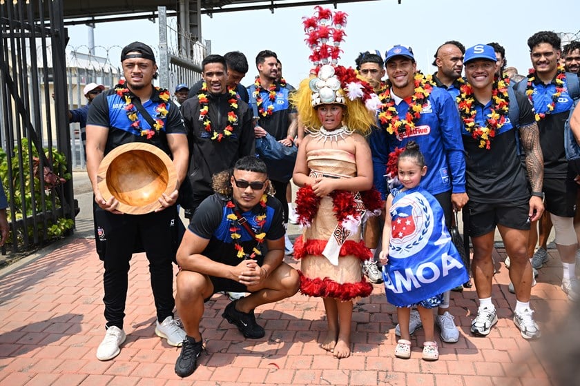 Samoan players, including Jarome Luai and Brian To'o, with fans who greeted their arrival in Port Moreseby