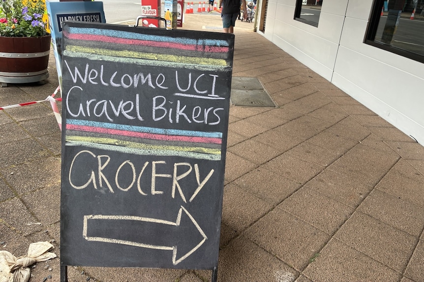 A sign outside the grocery shop in Nannup, welcoming the cyclists.