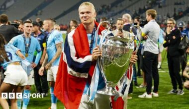Erling Haaland of Manchester City celebrates the UEFA Champions league with the trophy