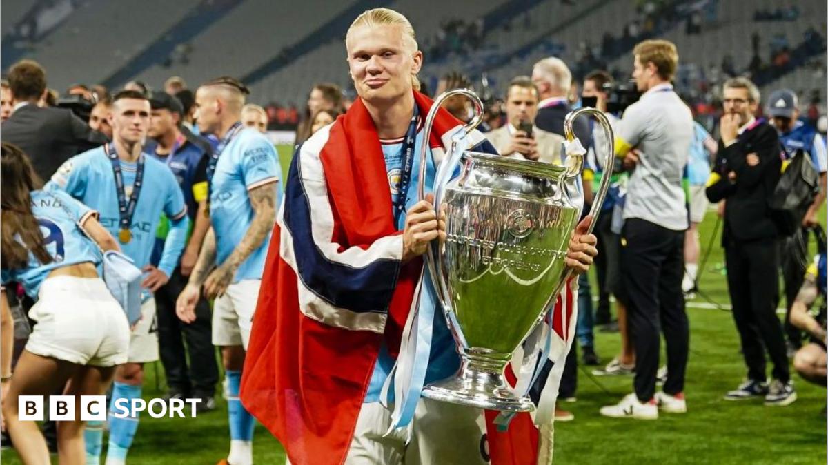 Erling Haaland of Manchester City celebrates the UEFA Champions league with the trophy