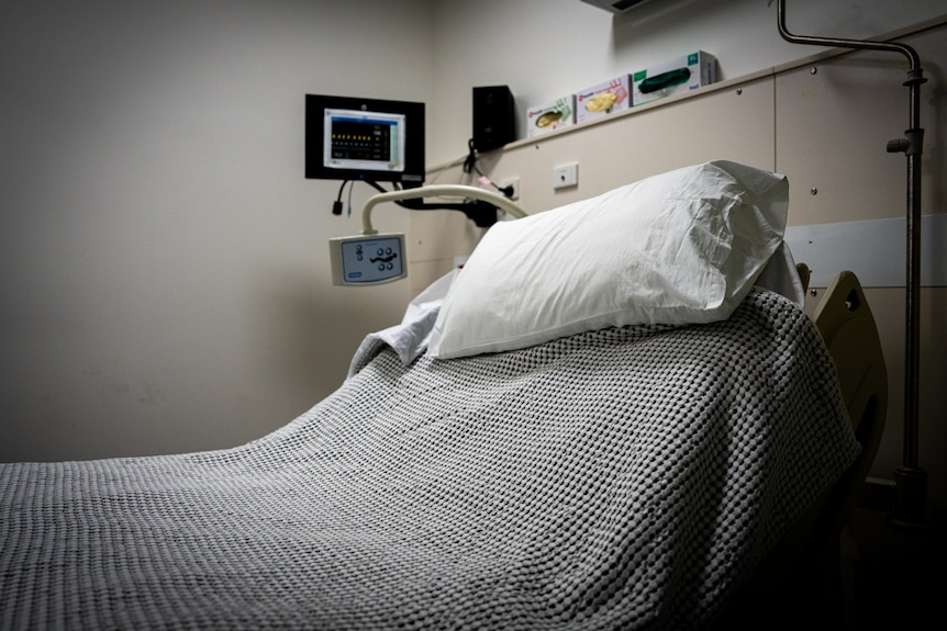 Empty hospital bed.