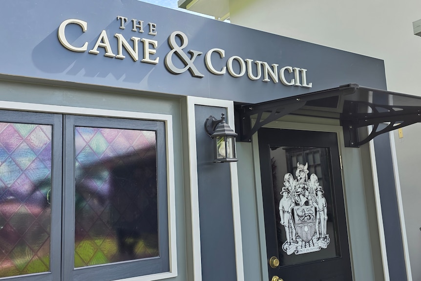 front of the pub with words Cane & Council on the front