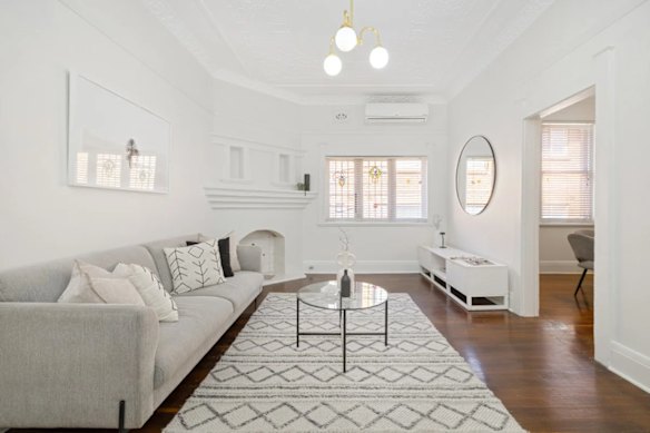 The two-bedroom semi has retained many of its original features.