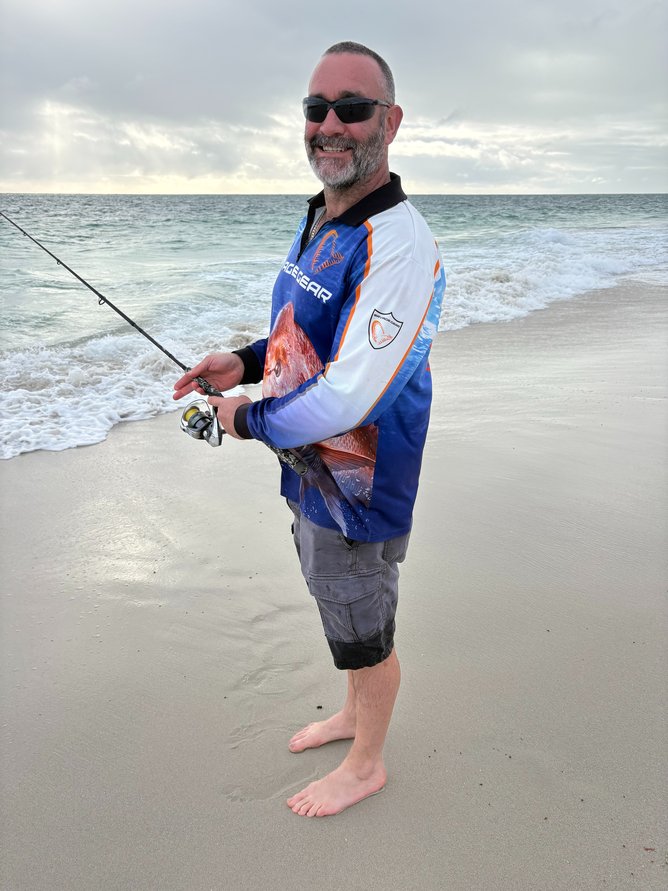 Alex Petrides fishing at Quinns Beach.