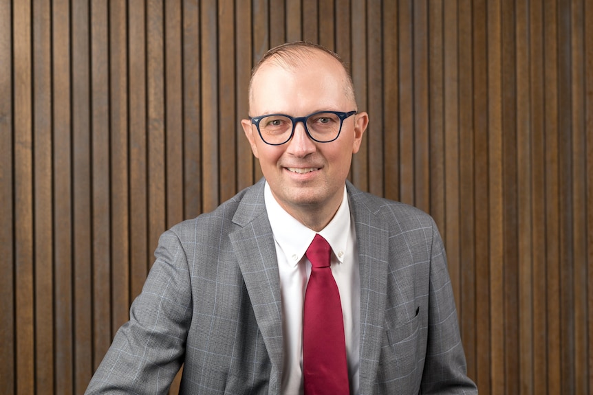 A headshot of Rico Merkert