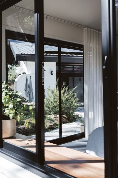 The project involved significant upgrades to the envelope to meet the bushfire attack rating, including significant investment in new windows and doors, while replicating the appearance of the original style.