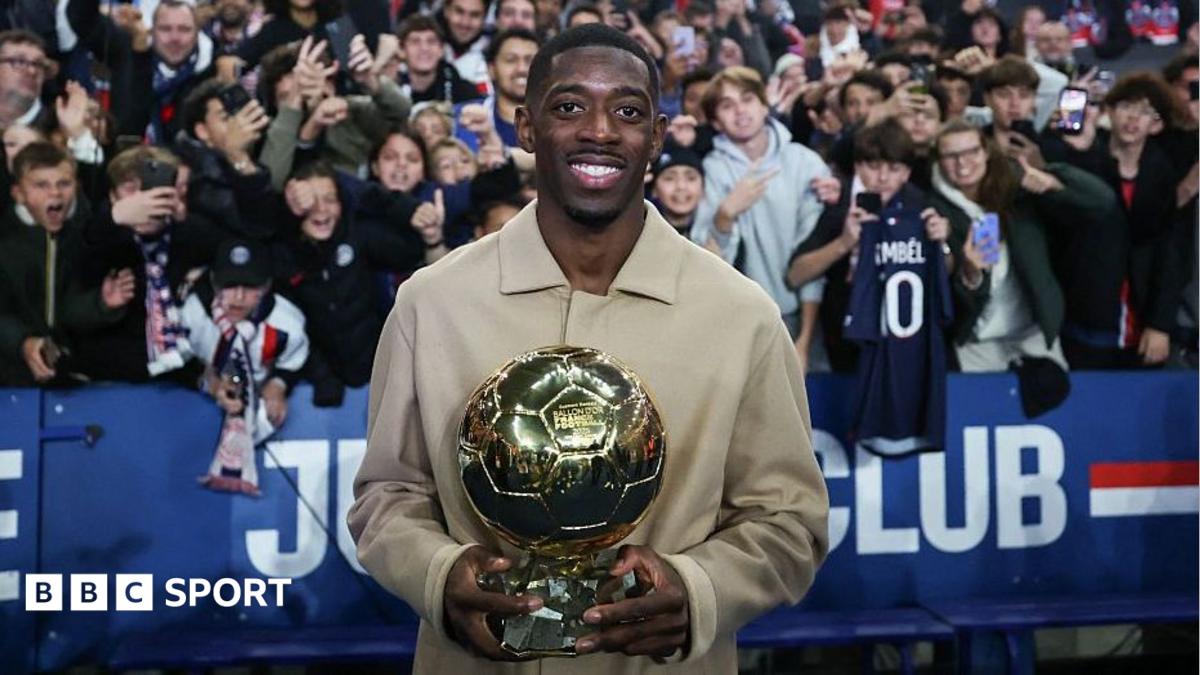 Ousmane Dembele shows off his Ballon d"Or