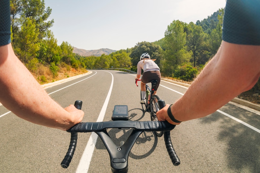 A POV shot road cycling in the Spanish mountains in the Jalon Valley on a hot summer's day.
