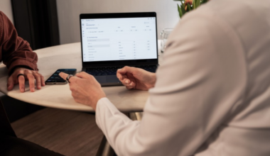 Doctor and patient talking at computer wearing Oura Ring