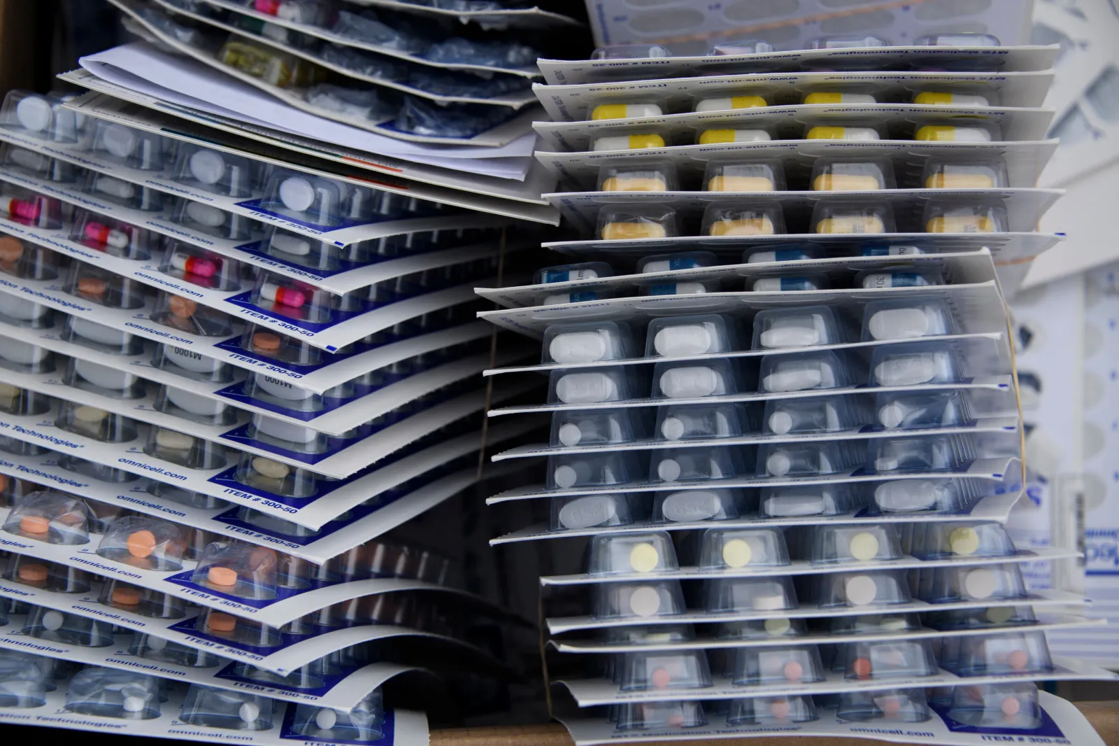 File photo: prescription drugs are seen in stacks at a healthcare center on April 24, 2021 in Los Angeles.