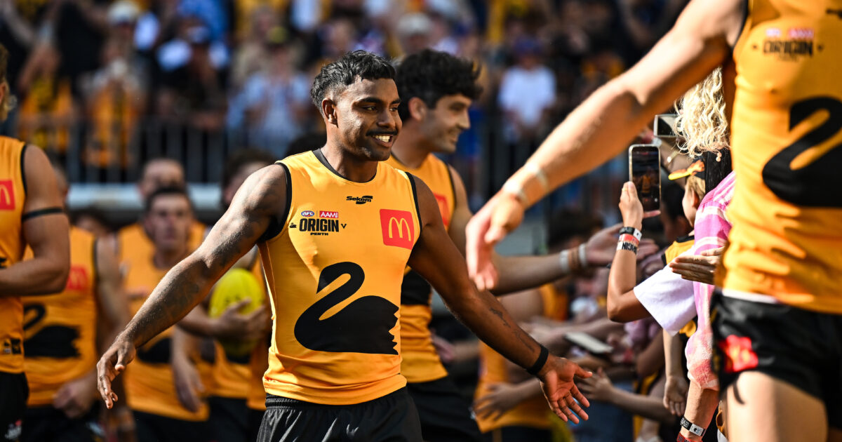 Two AFL stars lace the boots for off-season football game in regional Australia