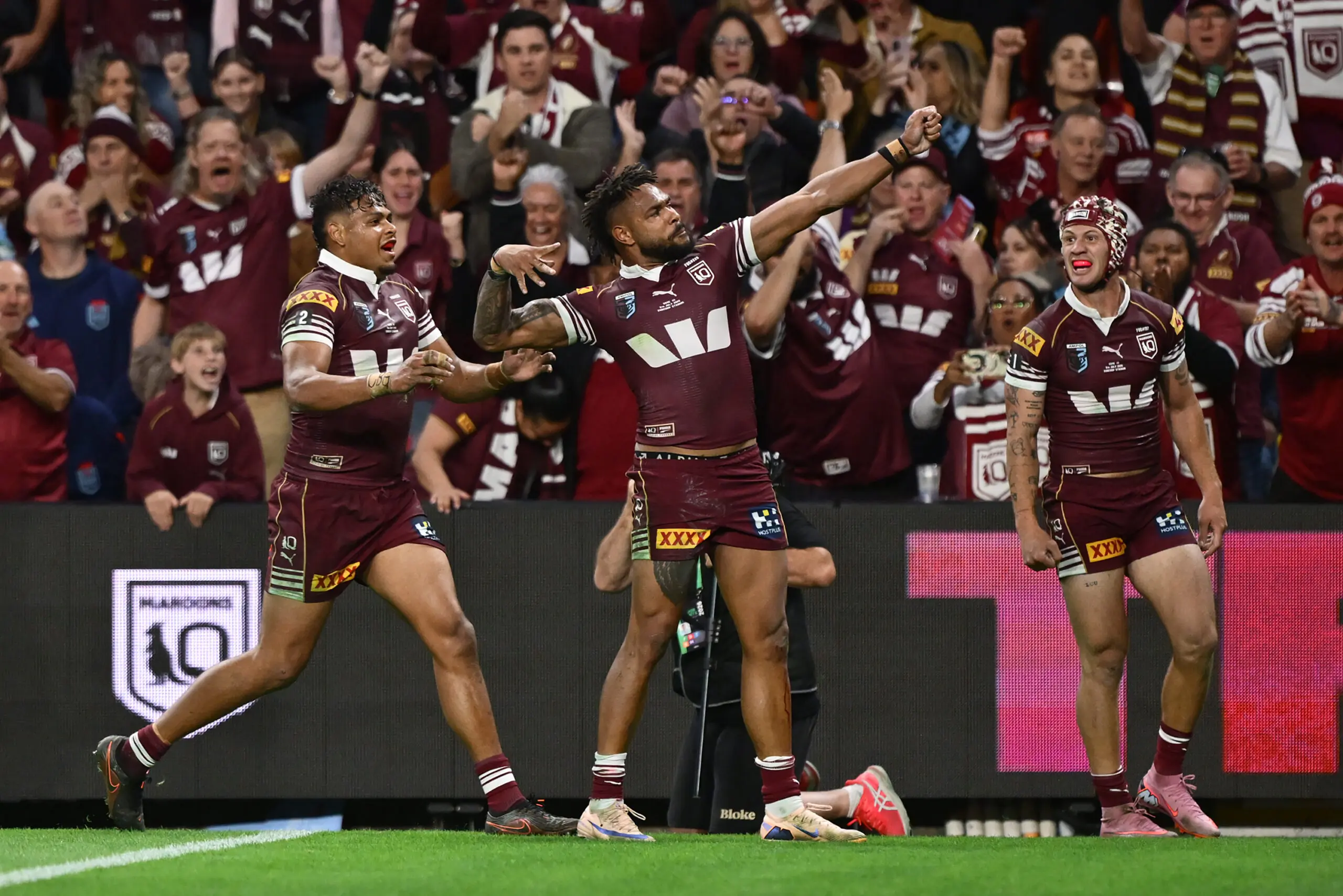 BRISBANE, AUSTRALIA - JULY 08: Hamiso Tabuai-Fidow of the Maroons celebrates scoring his teams first try during game three of the Men's State of Origin series between the Queensland Maroons and the New South Wales Blues at Suncorp Stadium on July 08, 2026 in Brisbane, Australia. (Photo by Bradley Kanaris/Getty Images)