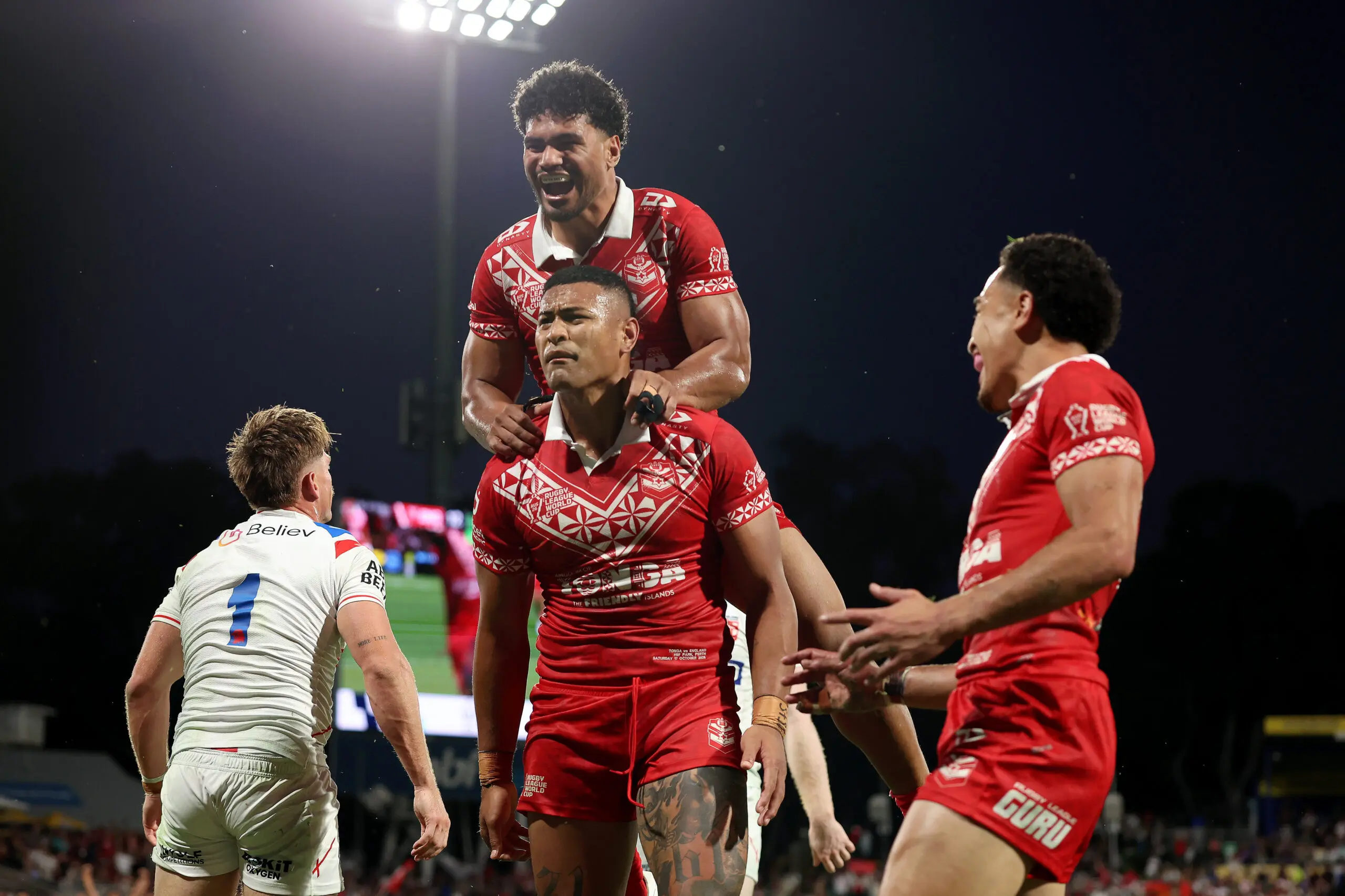 PERTH, AUSTRALIA - OCTOBER 17: Haumole Olakau'atu of Tonga celebrates a try during the 2026 Men's Rugby League World Cup match between England and Tonga at HBF Stadium on October 17, 2026 in Perth, Australia. (Photo by Janelle St Pierre/Getty Images)
