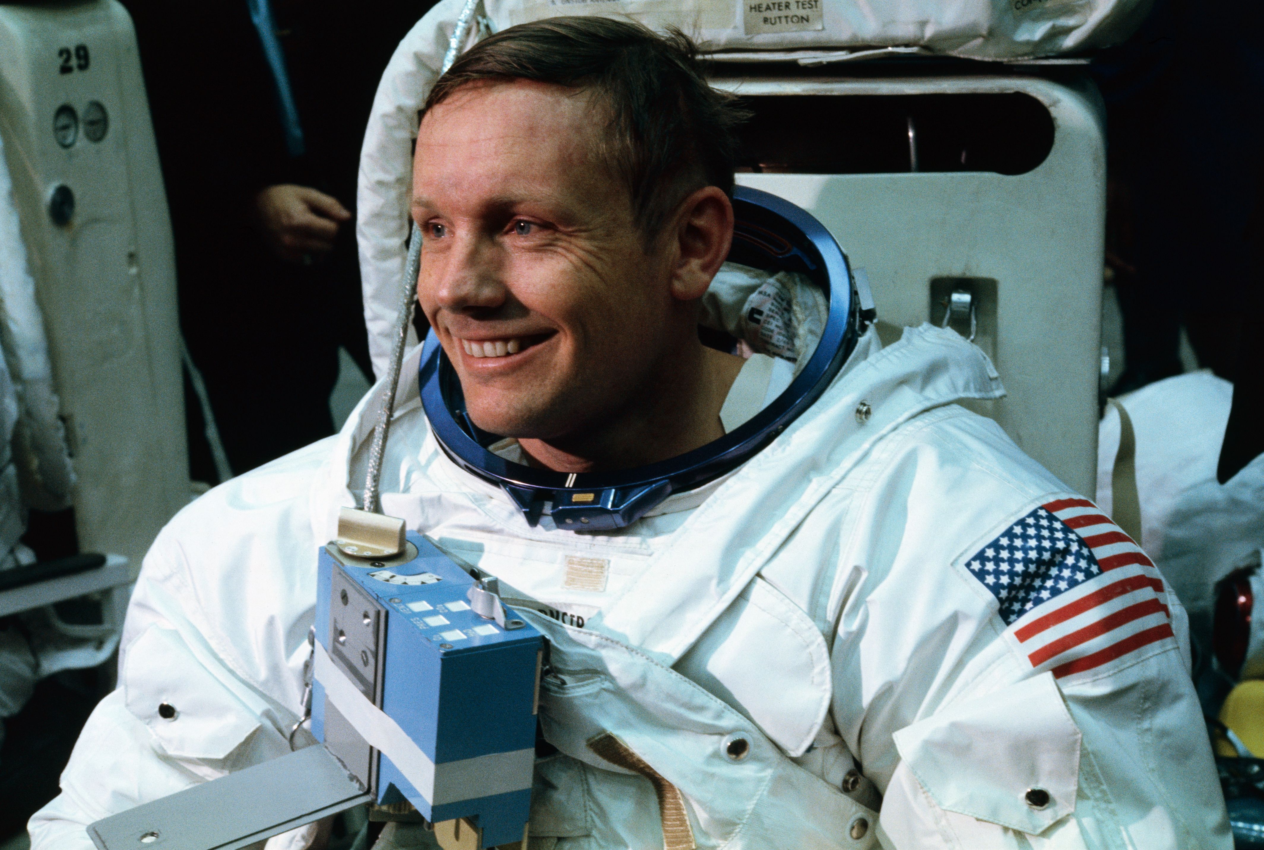 Astronaut Neil A. Armstrong, in training for the projected Apollo 11 lunar landing mission, is being suited up for the first full dress rehearsal of activities he is to perform during the projected moon landing. [Getty Images]