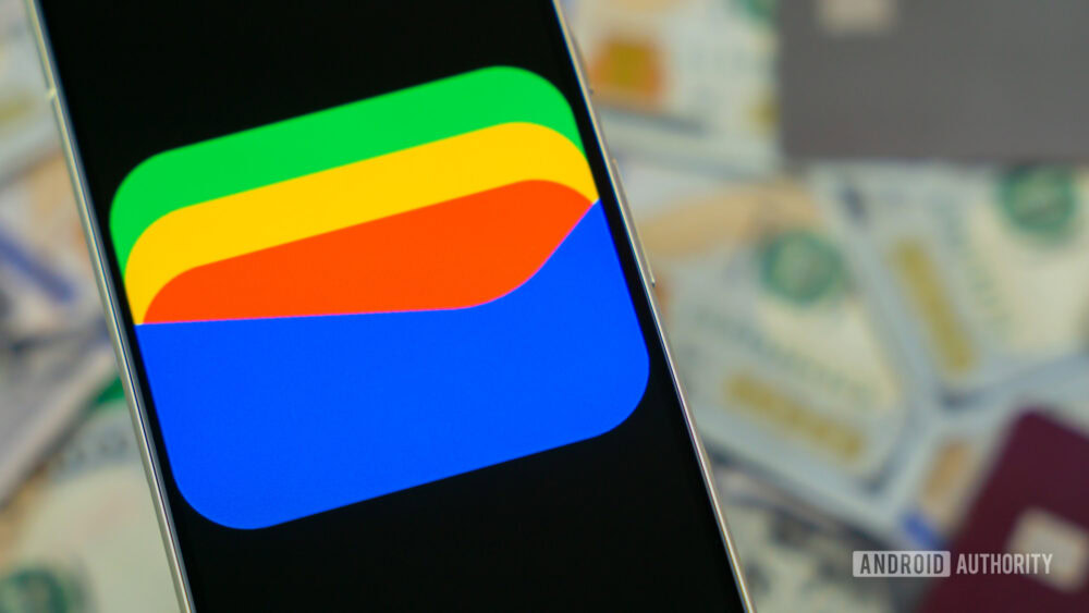 Google Wallet logo on smartphone next to credit cards and cash Stock photo 12 1000w 563h Google Wallet logo on smartphone next to credit cards and cash Stock photo 12 1000w 563h