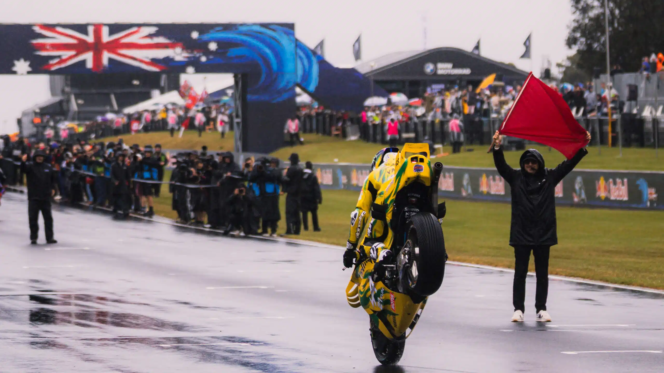 Jack Miller performs a stoppie at Phillip Island in the 2026 rain