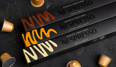 Why is Nestlé discontinuing its paper-based Nespresso capsules?