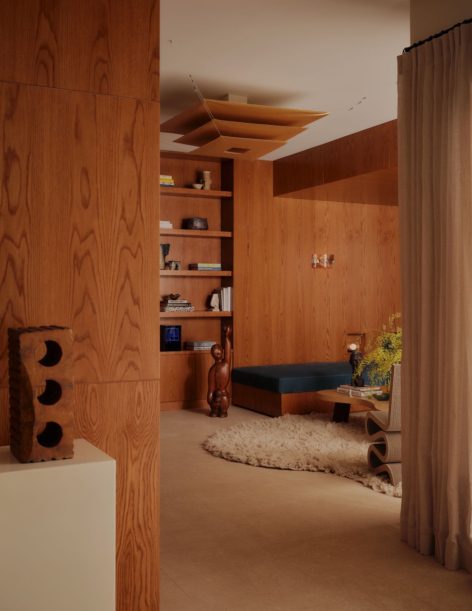 wood panelled room and bookcase
