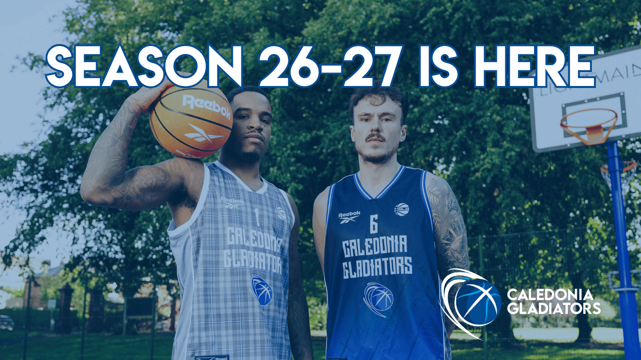 2 basketball players looking at camera