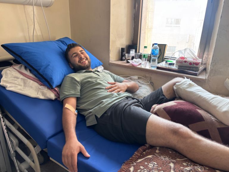 Sayed Ayyad, a patient at the hospital, receives treatment [Al Jazeera]
