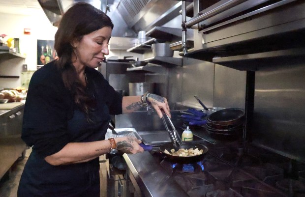 Olivia Ostrow, owner of Maison Ostrow in North Bay Village, sautes kosher chicken on Thursday, October 15, 2026. (Carline Jean/South Florida Sun Sentinel)