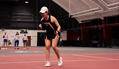 NIU women’s tennis then-sophomore Lucia Yecora celebrates a point  on Feb. 15. Yecora reached 102 combined career wins, the 20th NIU player to break 100 wins. (Northern Star file photo)