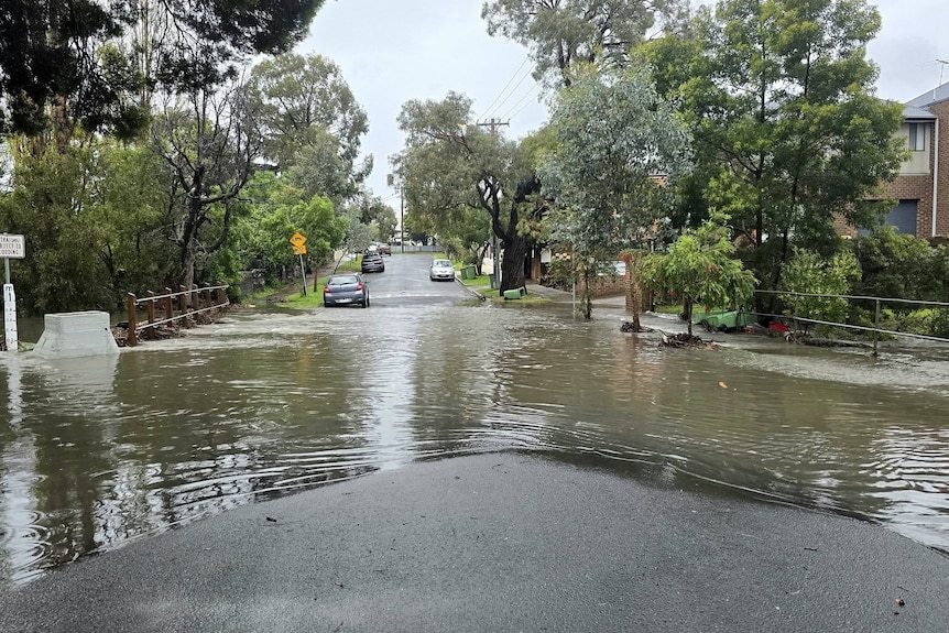 A flooded road in West Footscray following heavy rain.