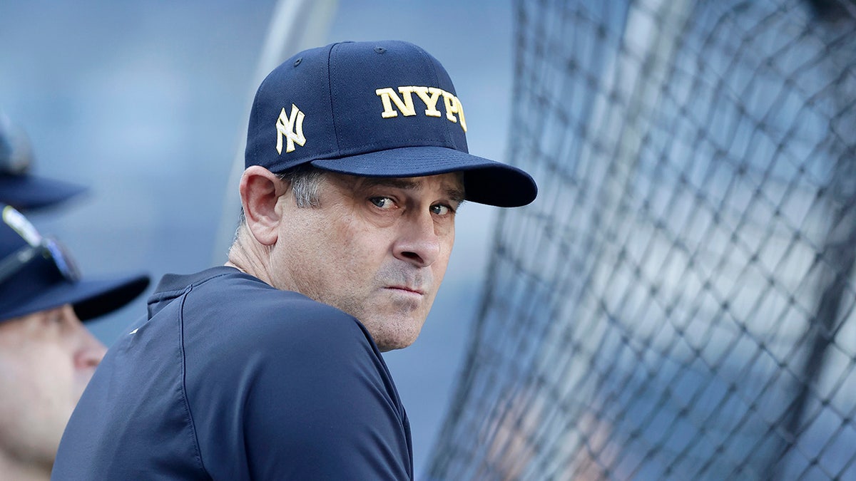 Manager Aaron Boone of the New York Yankees looks on during batting practice before a game against the Kansas City Royals at Yankee Stadium on September 11, 2024 in New York City.
