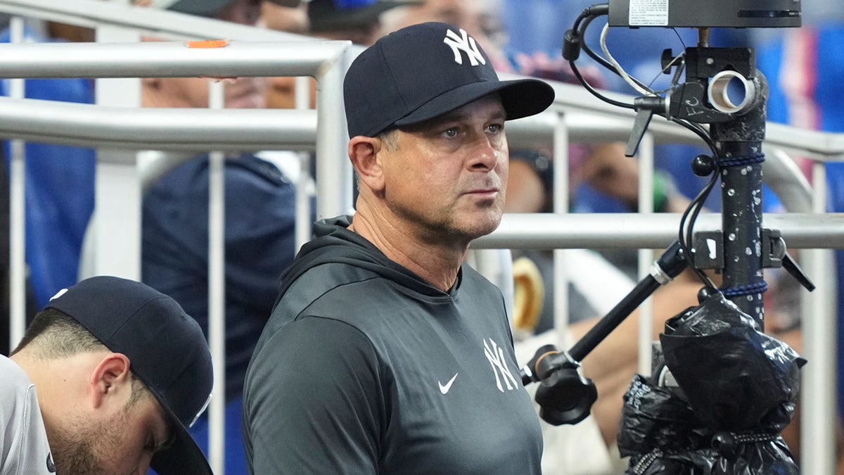 New York Yankees' manager Aaron Boone looks on during the seventh inning of a baseball game against the Miami Marlins, Saturday, Aug. 2, 2025, in Miami.