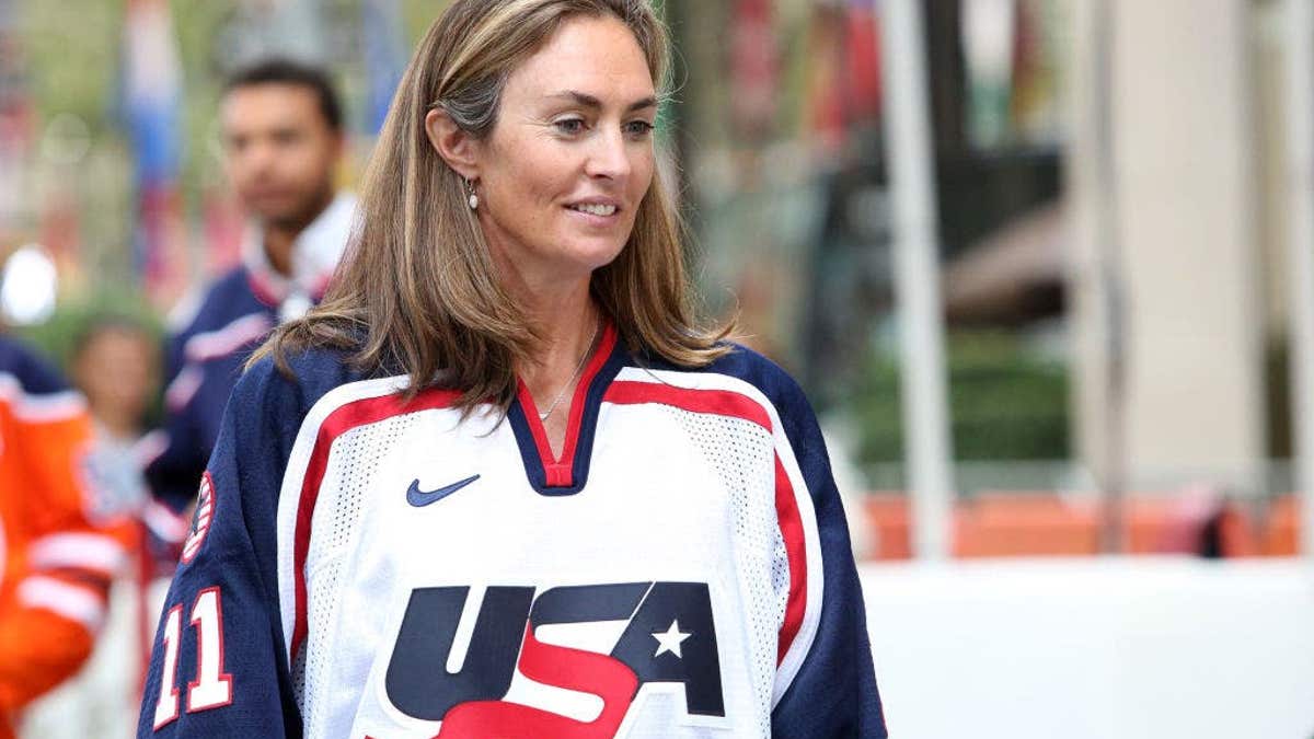 A.J. Mleczko, American Women's Ice Hockey Gold Medalist, looks on during NHL Street Hockey at Rockefeller Center.
