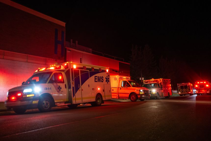 Emergency crews and military personnel pictured after a major fire breaks out at a Canadian military base.