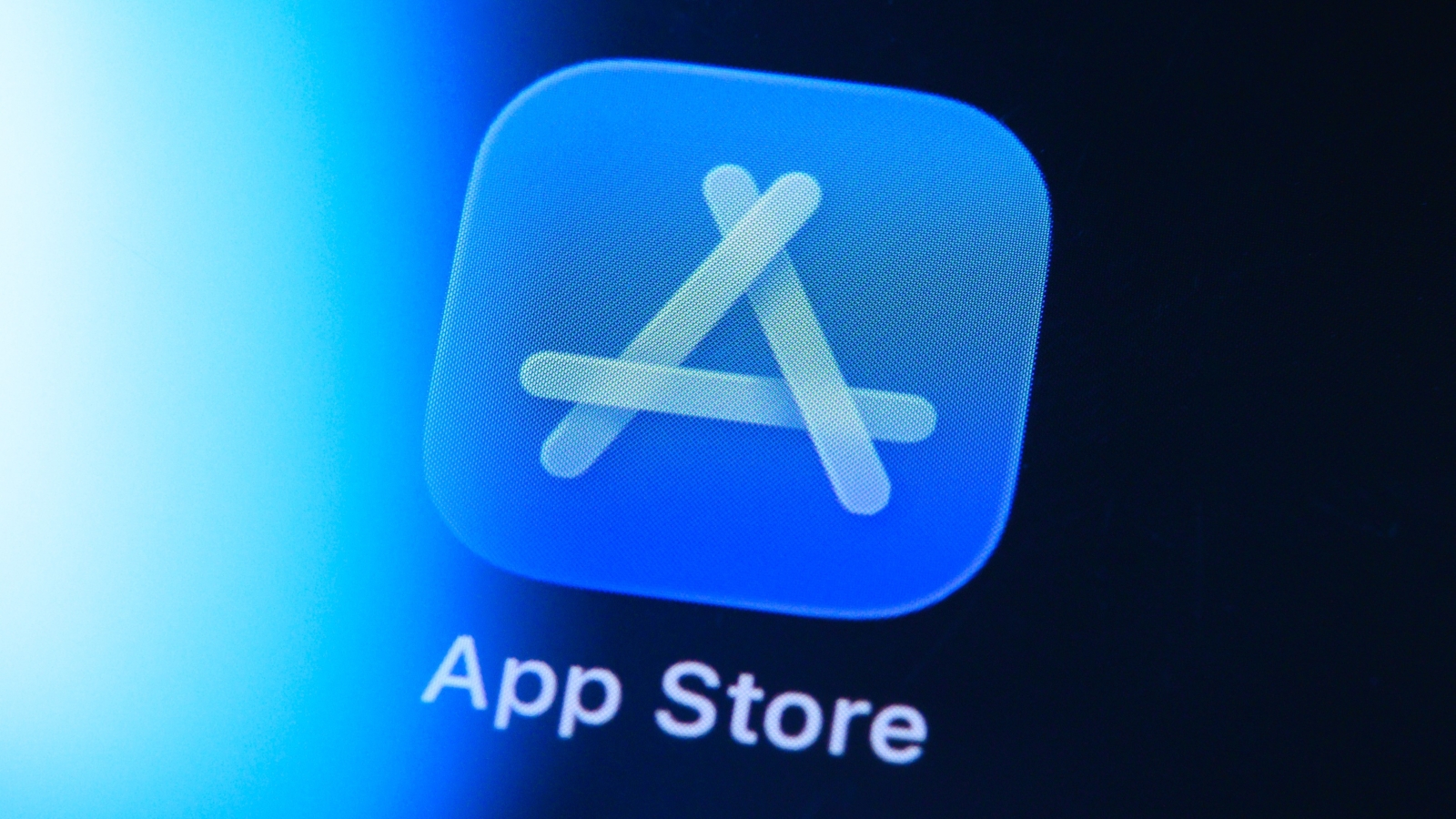 A closeup of the Apple App Store app icon on a screen.