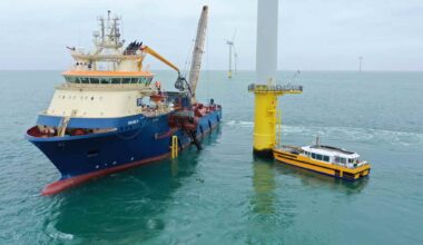 Diver placing recycled reef cubes at base of wind turbine foundation off Sussex coast, around 75 000