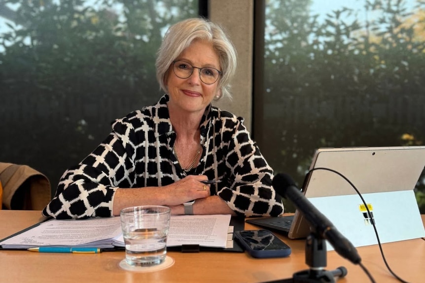 Helen Haines at her desk with a small sign saying Dr Helen Haines MP