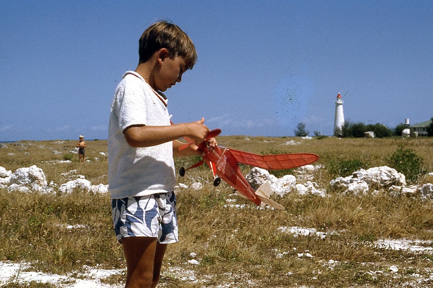 Boy with model plane