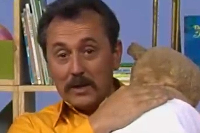 Alister Smart holding a toy.