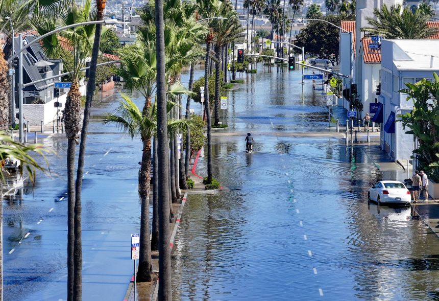 Seawater floods part of the Balboa Peninsula in Newport Beach, California, on October 9.