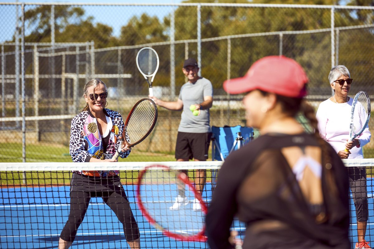 people playing tennis