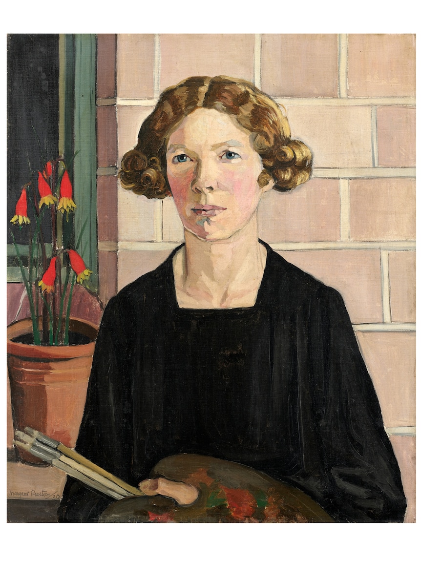 Oil painting of a serious middle-aged woman in black, holding a painters easel and brushes, red christmas bell flowers behind